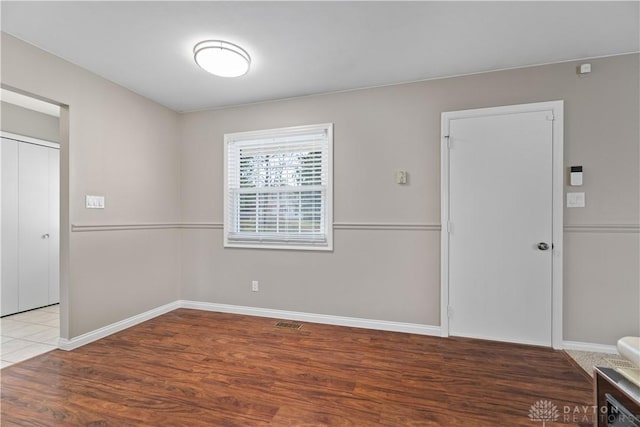 1824 Scotch Pine Dr, Beavercreek, OH 45432 - spare room featuring baseboards, visible vents, and wood finished floors