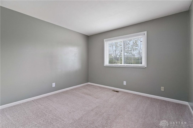 1824 Scotch Pine Dr, Beavercreek, OH 45432 - carpeted spare room featuring visible vents and baseboards
