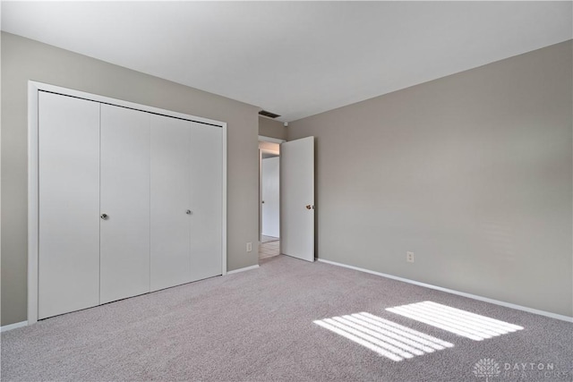 1824 Scotch Pine Dr, Beavercreek, OH 45432 - unfurnished bedroom featuring carpet, a closet, and baseboards