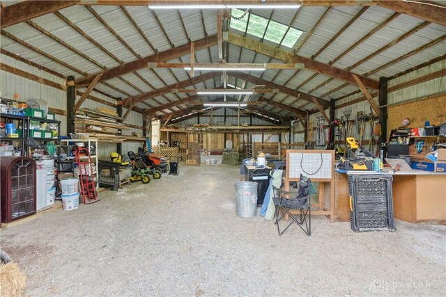 1572 State Route 380, Wilmington, OH 45177 - garage featuring metal wall and a workshop area