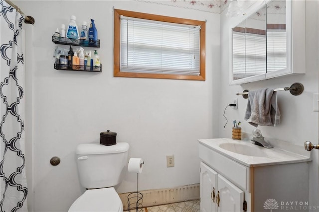 1572 State Route 380, Wilmington, OH 45177 - bathroom with toilet, a wealth of natural light, vanity, and curtained shower