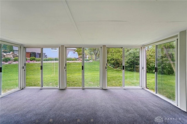 5741 Hithergreen Dr, Washington Twp, OH 45429 - unfurnished sunroom with plenty of natural light, floor to ceiling windows, and carpet