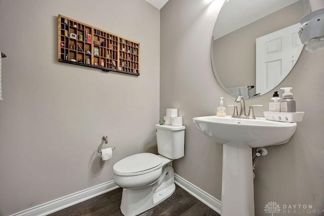 1737 Red Clover Dr, Lebanon, OH 45036 - bathroom featuring wood finished floors, toilet, and baseboards