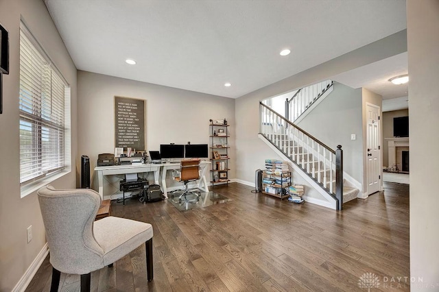 1737 Red Clover Dr, Lebanon, OH 45036 - office space featuring wood finished floors, baseboards, recessed lighting, and a fireplace with raised hearth