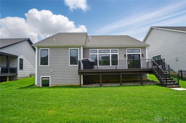 9917 Rothschild Ct, Clearcreek Twp, OH 45458 - rear view of property featuring a deck, stairs, a yard, and a shingled roof