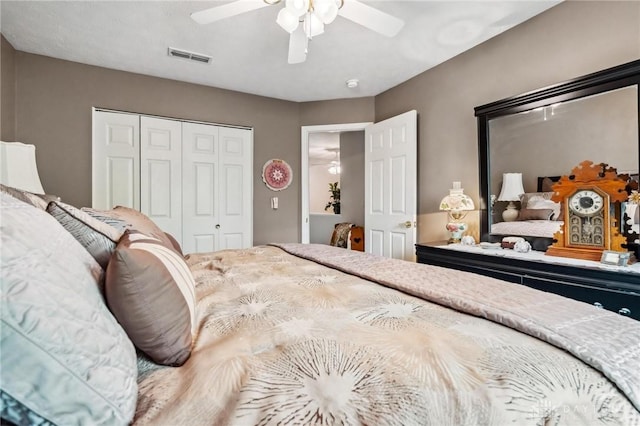 bedroom featuring a closet and a ceiling fan