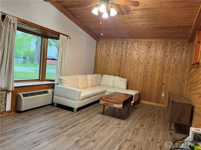 2 Brompton Ln, Cincinnati, OH 45218 - living area featuring vaulted ceiling, a ceiling fan, a wall unit AC, wood ceiling, and light wood finished floors