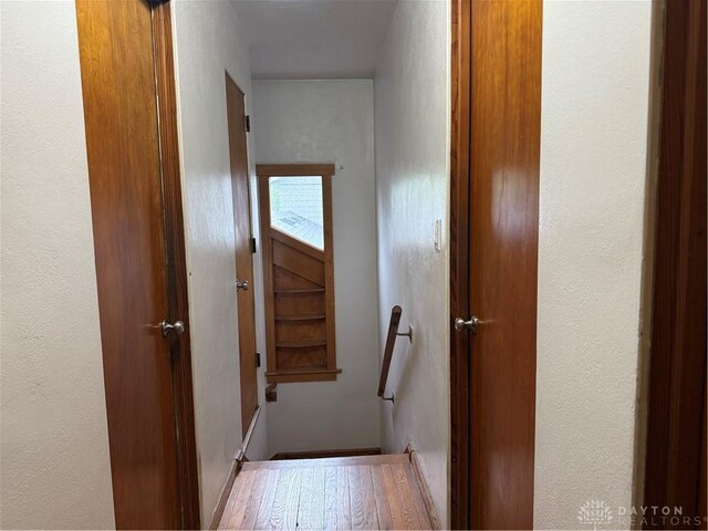 2 Brompton Ln, Cincinnati, OH 45218 - corridor with an upstairs landing and wood finished floors