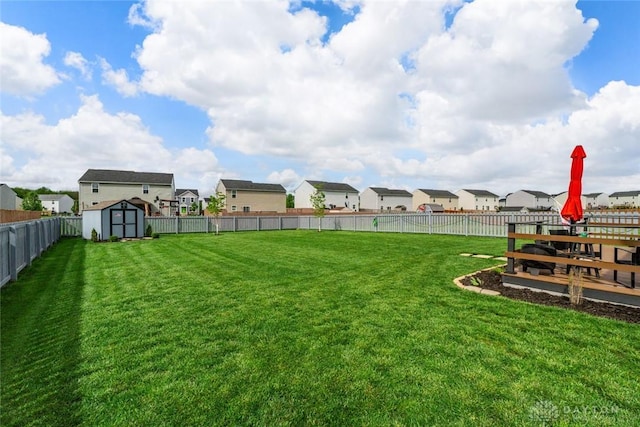 1194 Lisa Marie Dr, Xenia, OH 45385 - view of yard featuring a residential view, a shed, and an outbuilding