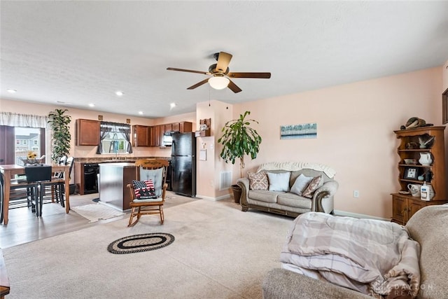 1194 Lisa Marie Dr, Xenia, OH 45385 - living area with ceiling fan, recessed lighting, and baseboards