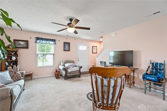 1194 Lisa Marie Dr, Xenia, OH 45385 - living area with ceiling fan, carpet flooring, and baseboards