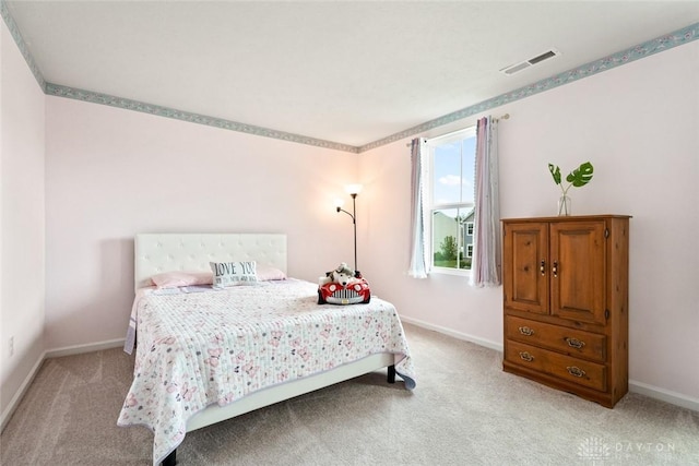 1194 Lisa Marie Dr, Xenia, OH 45385 - bedroom featuring light colored carpet and baseboards