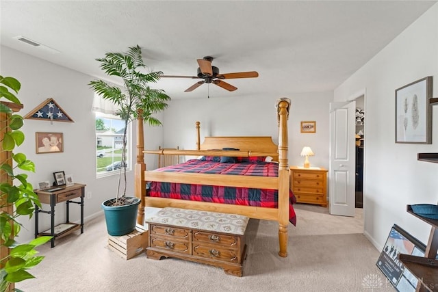 1194 Lisa Marie Dr, Xenia, OH 45385 - bedroom with carpet flooring, a spacious closet, baseboards, and ceiling fan