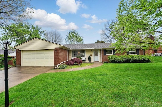 ranch-style house with a garage, brick siding, a front yard, and driveway