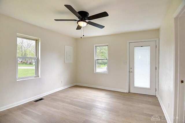 3417 Beechgrove Rd, Moraine, OH 45439 - spare room featuring ceiling fan, light wood-style floors, and baseboards