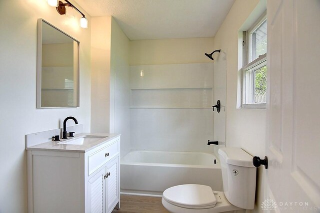 3417 Beechgrove Rd, Moraine, OH 45439 - full bathroom with toilet, shower / tub combination, vanity, and wood finished floors