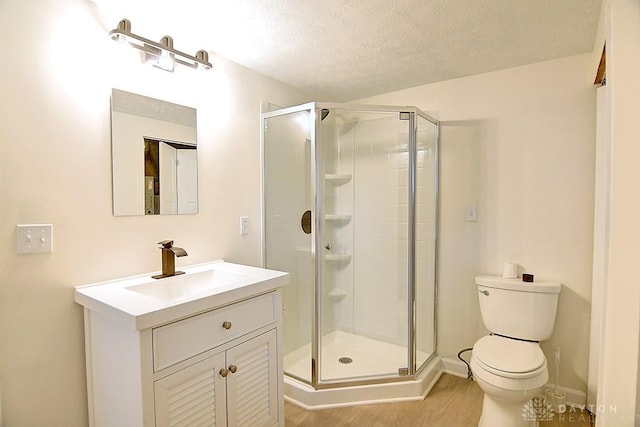 3417 Beechgrove Rd, Moraine, OH 45439 - full bath with wood finished floors, a shower stall, toilet, vanity, and a textured ceiling
