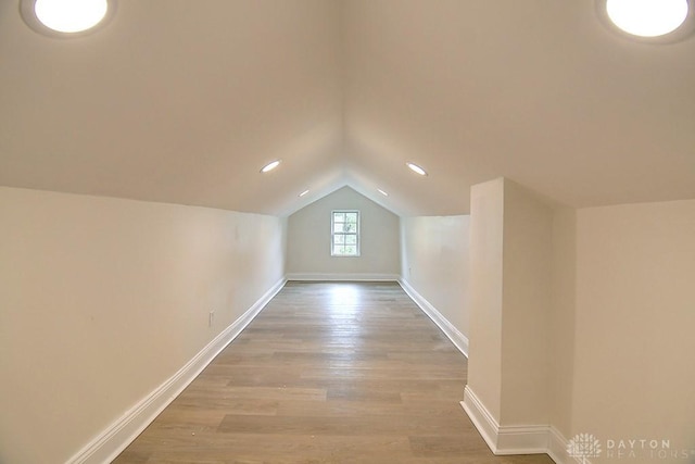 3417 Beechgrove Rd, Moraine, OH 45439 - additional living space with lofted ceiling, wood finished floors, baseboards, and recessed lighting