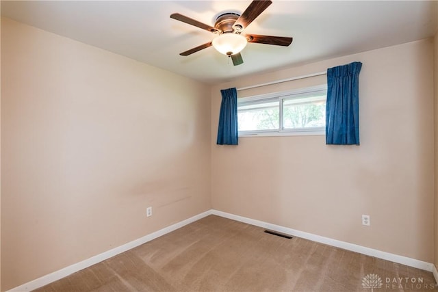 3762 Waterbury Dr, Kettering, OH 45439 - empty room with ceiling fan, baseboards, and light colored carpet