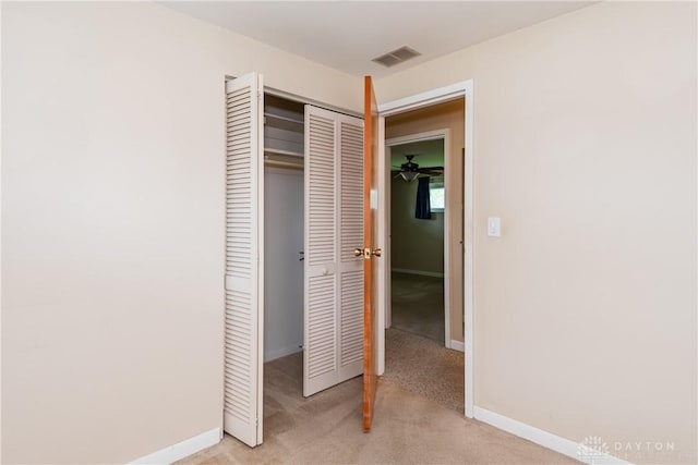 3762 Waterbury Dr, Kettering, OH 45439 - unfurnished bedroom featuring light colored carpet, baseboards, and a closet