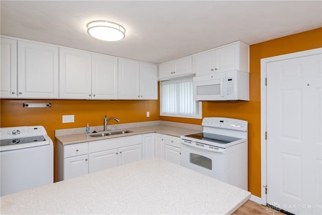 3762 Waterbury Dr, Kettering, OH 45439 - kitchen featuring washer / clothes dryer, white appliances, a sink, white cabinetry, and light countertops