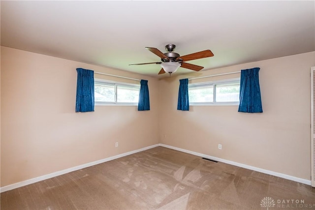 3762 Waterbury Dr, Kettering, OH 45439 - unfurnished room with a ceiling fan, baseboards, and plenty of natural light