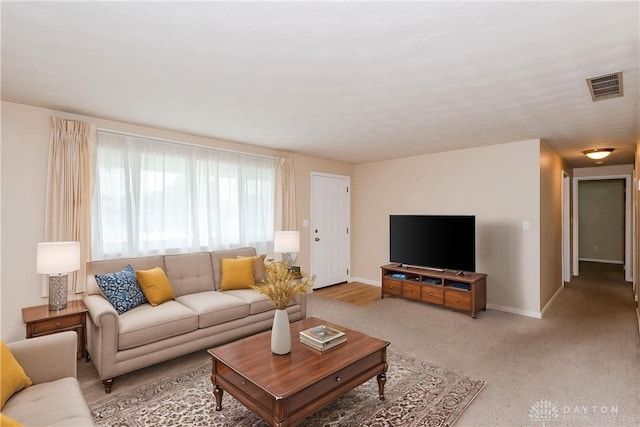 3762 Waterbury Dr, Kettering, OH 45439 - living room with baseboards and light carpet