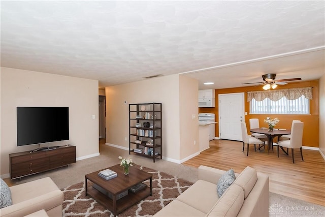 3762 Waterbury Dr, Kettering, OH 45439 - living room with a ceiling fan and baseboards