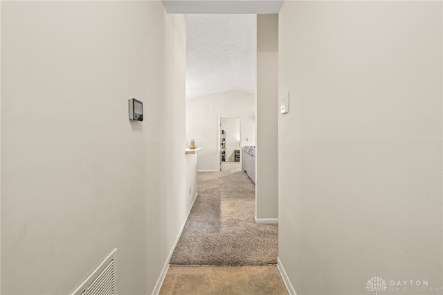 108 Mallard Glen Dr Unit 7, Dayton, OH 45458 - corridor with light colored carpet, baseboards, and lofted ceiling