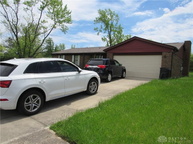 3363 Cortez Dr, Dayton, OH 45415 - view of front of home featuring brick siding
