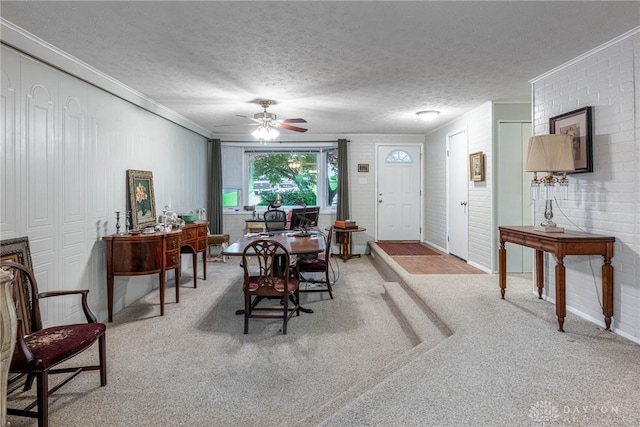2084 Firebird Dr, Bellbrook, OH 45305 - dining area with ornamental molding, light colored carpet, a ceiling fan, and a textured ceiling