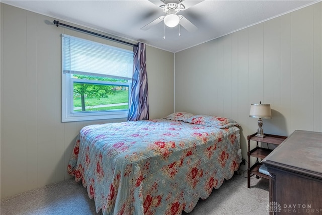 2084 Firebird Dr, Bellbrook, OH 45305 - bedroom featuring carpet, a ceiling fan, and a decorative wall