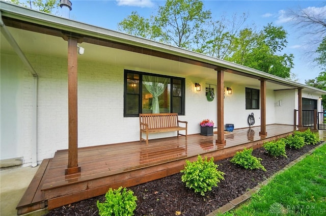 2023 W State Route 63, Lebanon, OH 45036 - back of house featuring covered porch and brick siding