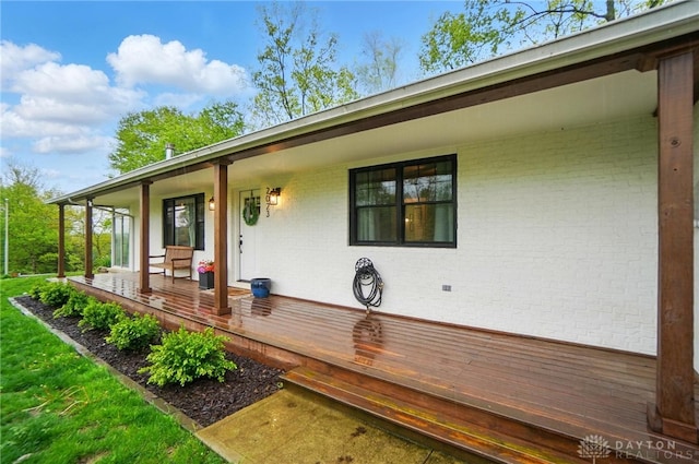 2023 W State Route 63, Lebanon, OH 45036 - view of exterior entry featuring covered porch and brick siding