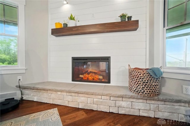 2023 W State Route 63, Lebanon, OH 45036 - detailed view of wood finished floors and a glass covered fireplace