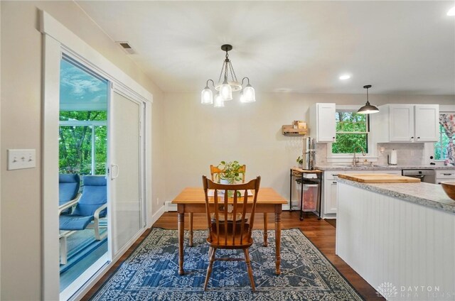 2023 W State Route 63, Lebanon, OH 45036 - dining room with dark wood-type flooring, a chandelier, and recessed lighting