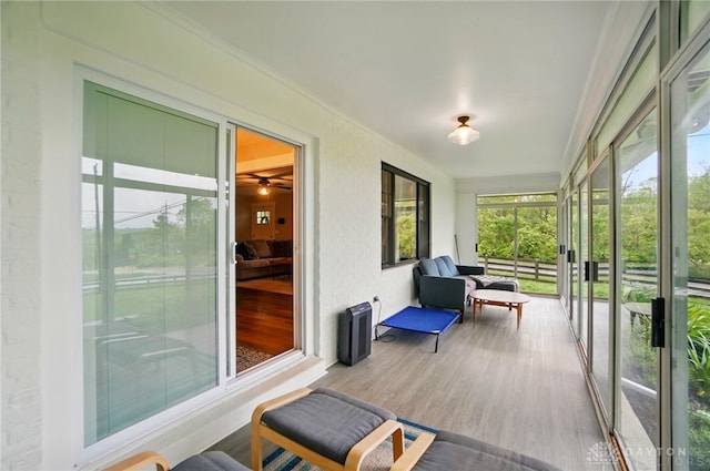 2023 W State Route 63, Lebanon, OH 45036 - sunroom / solarium featuring wood finished floors and crown molding