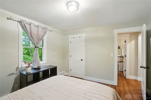 2023 W State Route 63, Lebanon, OH 45036 - bedroom featuring baseboards and wood finished floors