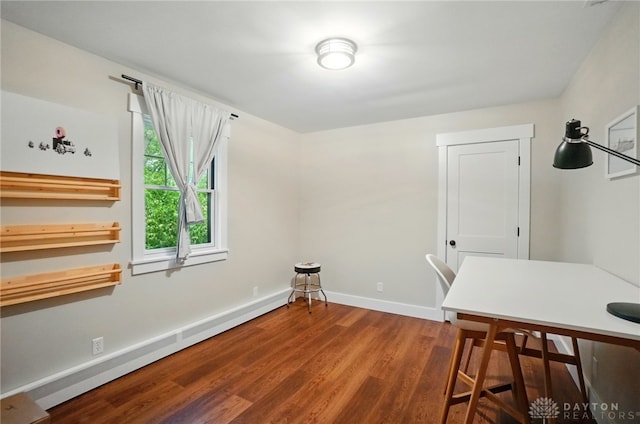 2023 W State Route 63, Lebanon, OH 45036 - dining area featuring a baseboard radiator, wood finished floors, and baseboards