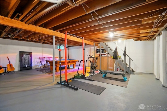 2023 W State Route 63, Lebanon, OH 45036 - workout room featuring billiards and concrete block wall