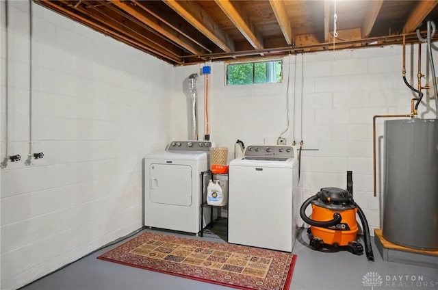 2023 W State Route 63, Lebanon, OH 45036 - laundry room featuring gas water heater, independent washer and dryer, and concrete block wall