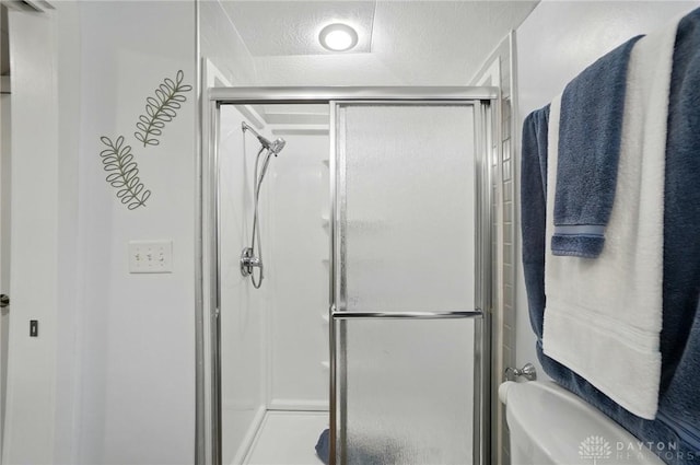 6859 US Highway 62 NE, Washington Court Hous, OH 43160 - full bathroom with a stall shower and a textured ceiling