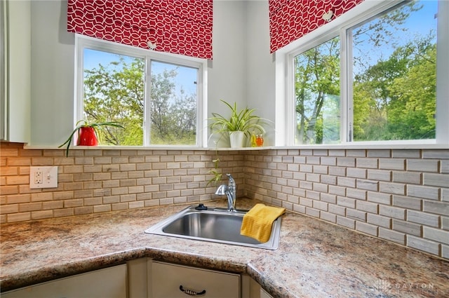 6859 US Highway 62 NE, Washington Court Hous, OH 43160 - kitchen view of a sink, tasteful backsplash, light countertops, and white cabinetry