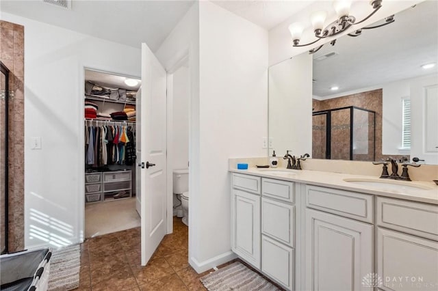 10280 Benjamin Way, Washington Twp, OH 45458 - full bathroom featuring toilet, a shower stall, double vanity, a spacious closet, and tile patterned floors