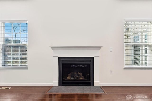 10280 Benjamin Way, Washington Twp, OH 45458 - detailed view of wood finished floors and a fireplace with flush hearth