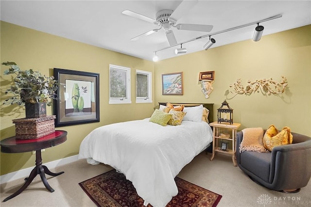 1900 Kresswood Cir, Kettering, OH 45429 - carpeted bedroom featuring track lighting and ceiling fan