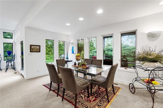 1900 Kresswood Cir, Kettering, OH 45429 - dining area with baseboards, light colored carpet, and recessed lighting