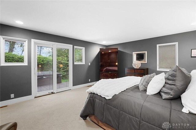 1900 Kresswood Cir, Kettering, OH 45429 - bedroom with access to exterior, baseboards, carpet, and recessed lighting
