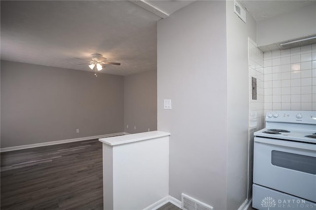 2525 Lakeview Ave, Dayton, OH 45417 - kitchen featuring white range with electric stovetop, ceiling fan, dark wood-style floors, and baseboards