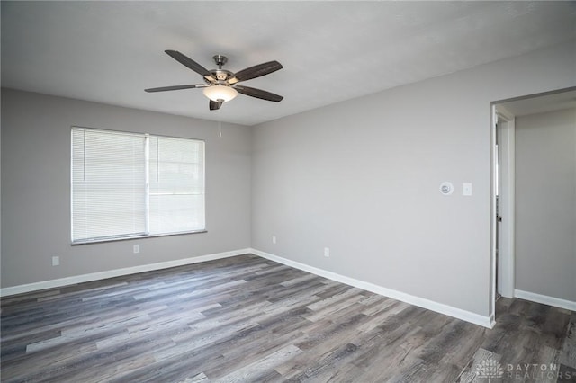 2525 Lakeview Ave, Dayton, OH 45417 - spare room with ceiling fan, dark wood-style flooring, and baseboards